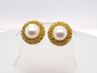 A lovely pair of elegant earrings, each set with a 7.7 mm cultured pearl.