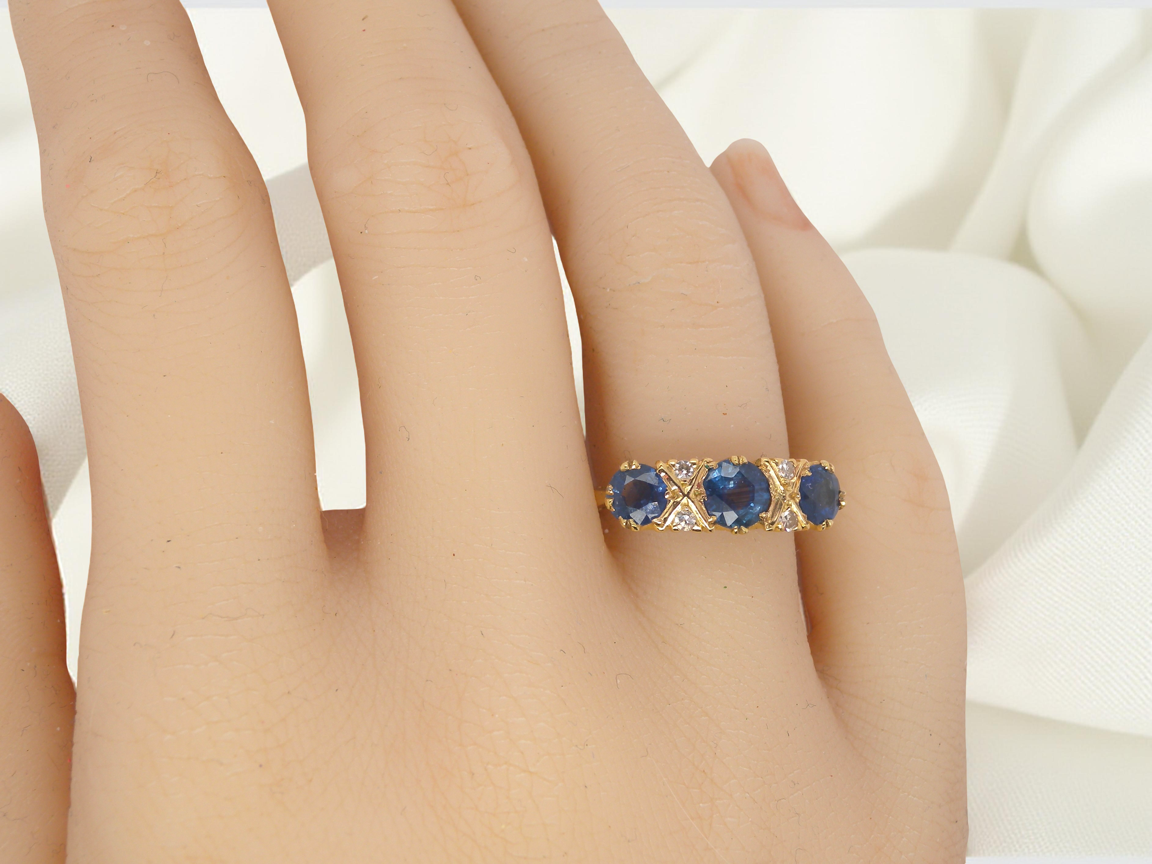 A lovely ring from the turn of the 19th century. Set with round sapphires,