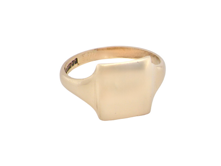 A man's plain gold signet ring rectangular