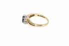 Side view of amethyst and diamond cluster ring