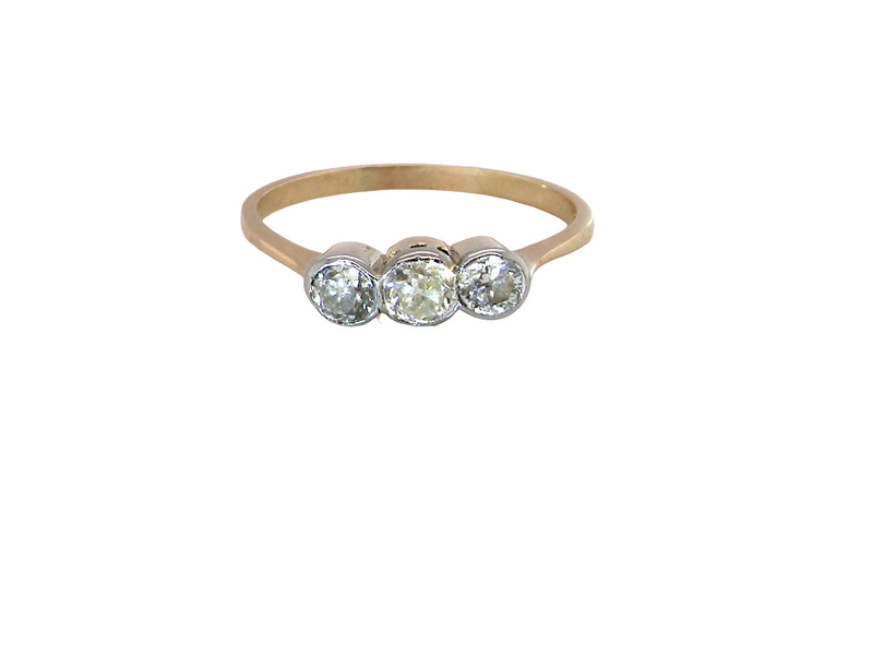 A vintage diamond trilogy ring