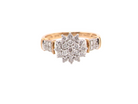 A modern 9 carat gold cluster ring featuring a round head fully set with brilliant-cut white diamonds,