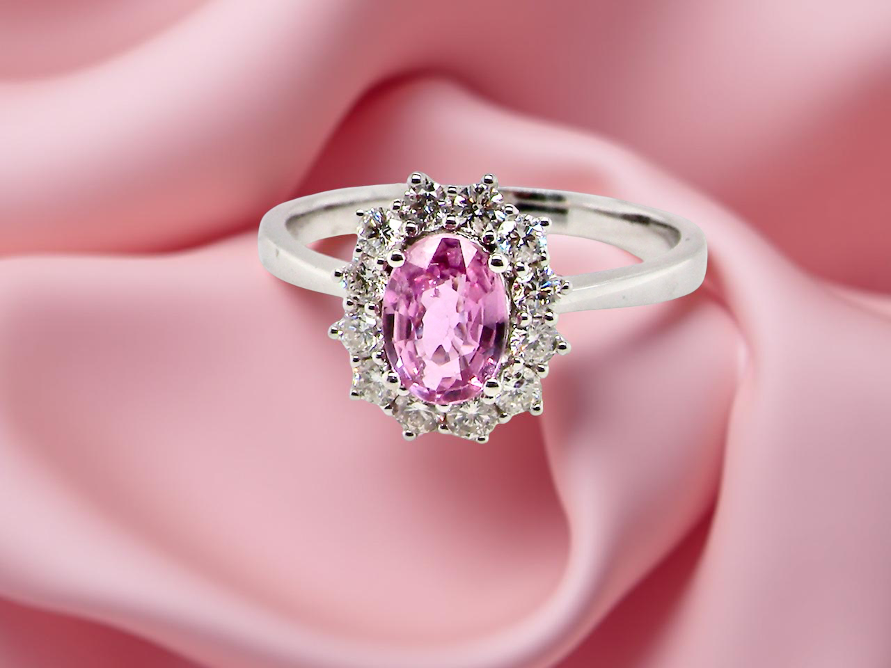 A modern Pink Sapphire and Diamond Ring