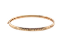 A modern gold bangle