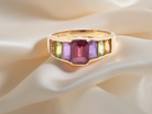 A multi gemstone dress ring