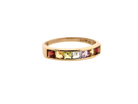 A multi gemstone half hoop ring