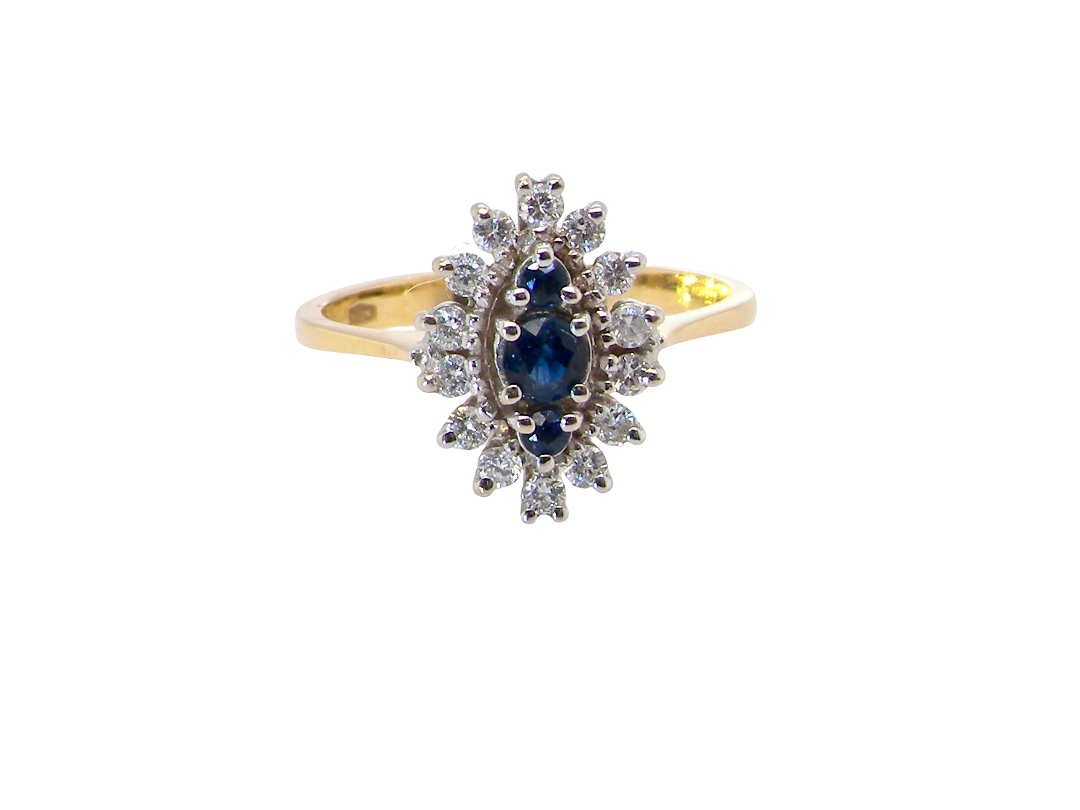 A navette shaped cluster ring. 