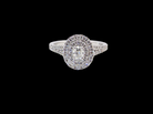 A new diamond cluster ring* An oval diamond halo cluster ring. Set with brilliant cut white diamonds,