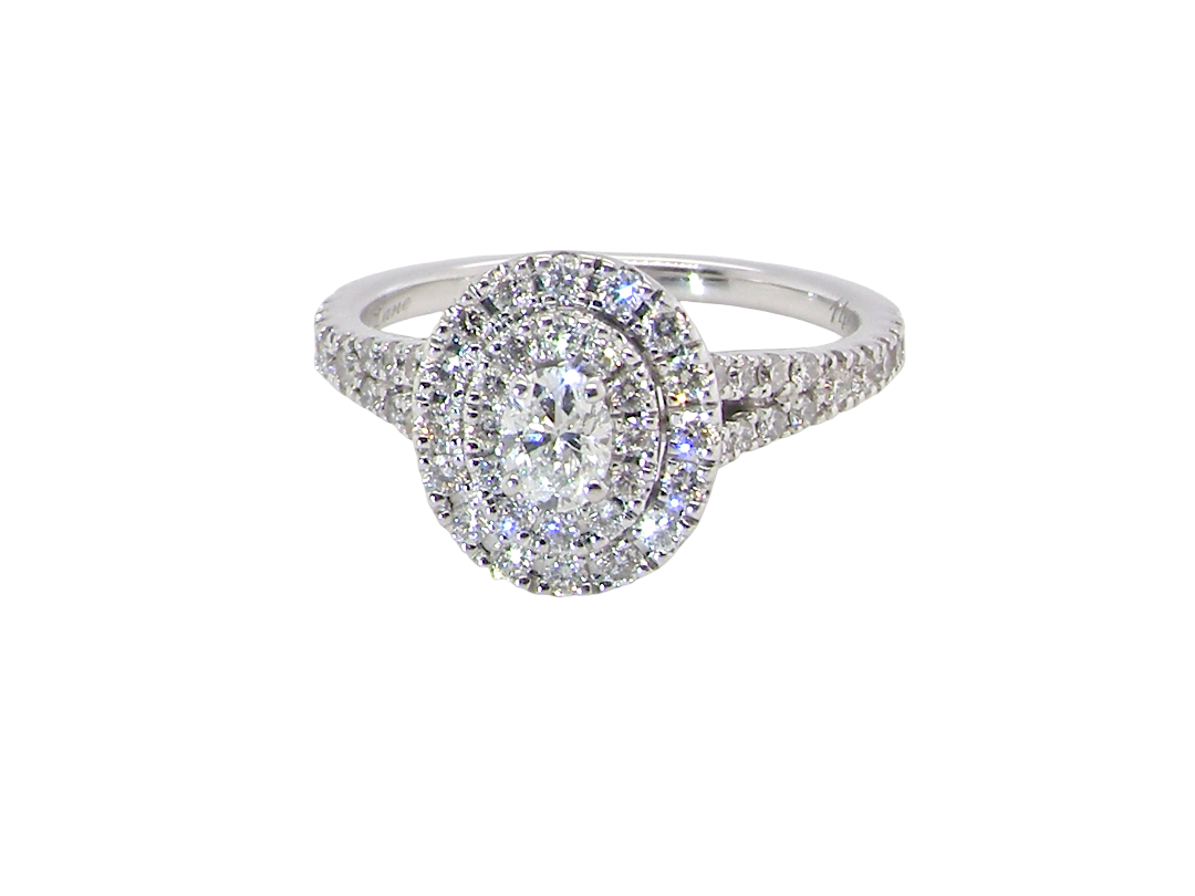 A new diamond cluster ring* An oval diamond halo cluster ring. Set with brilliant cut white diamonds, colour H-k,