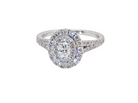 A new diamond cluster ring* An oval diamond halo cluster ring. Set with brilliant cut white diamonds, colour H-k,