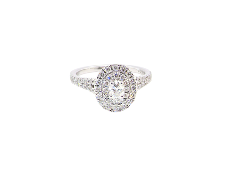 A pretty NEW white gold Diamond cluster ring