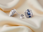 A pair 9 carat White Gold Sapphire &amp; Diamond Earrings