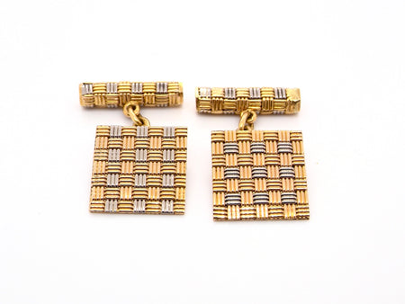 A pair of 18 carat gold cuff links by famous London designer Roy King.
