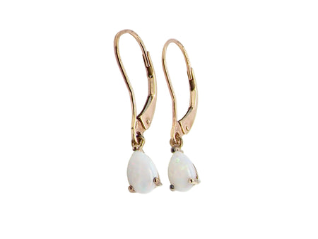 A pair of 9 carat gold drop earrings. Each set with a pear shaped white opal, 6x4mm.
