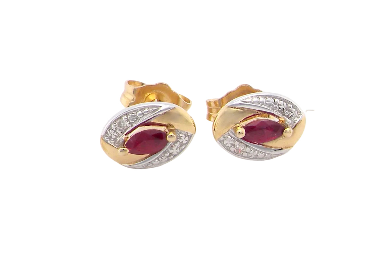 A pair of 9 carat gold earrings.

Centre stone a marquise cut ruby, 5x3mm
