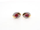 A pair of 9 carat gold earrings.

Centre stone an marquise cut ruby, 5x3mm