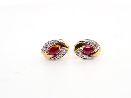 A pair of 9 carat gold earrings.

Centre stone an marquise cut ruby, 5x3mm