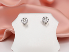 A pair of 9 carat white gold diamond stud earrings.&nbsp;

cluster 
