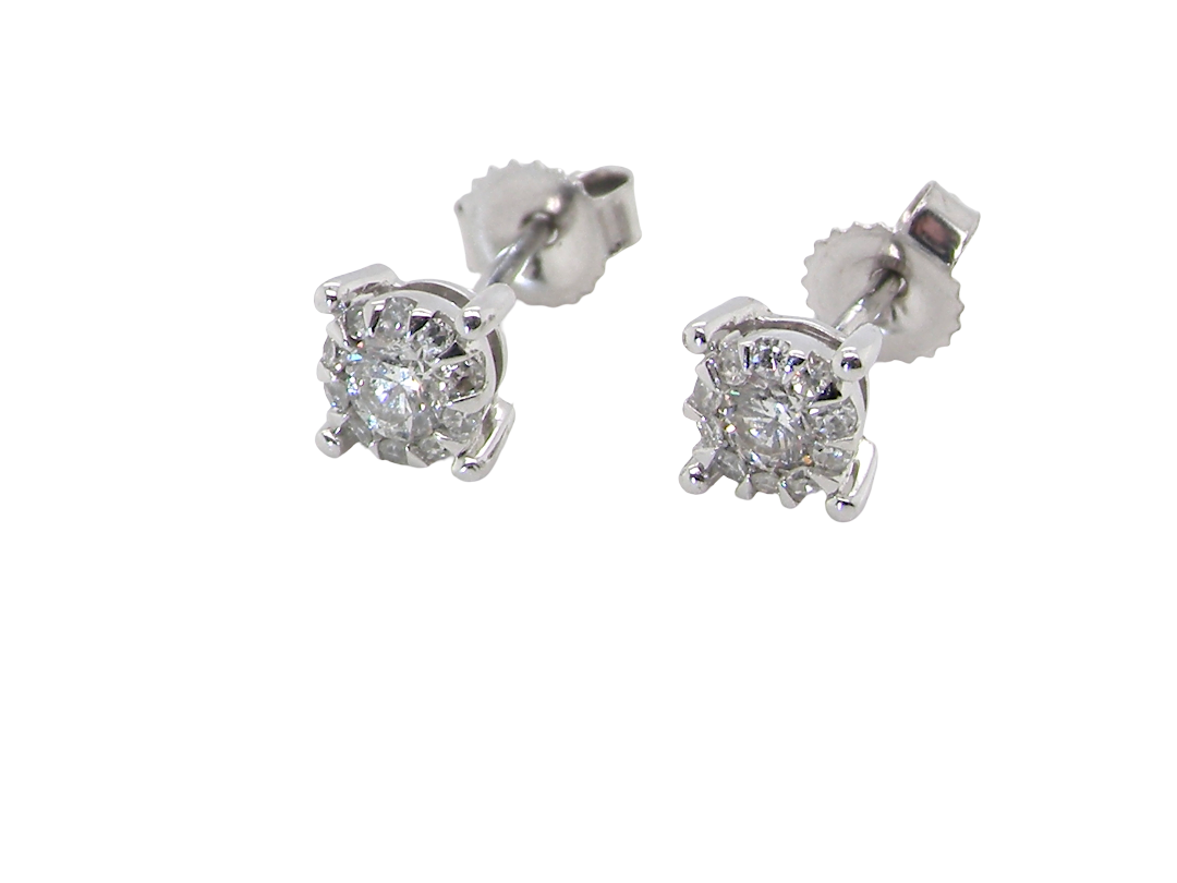 A pair of 9 carat white gold earrings. At first glance the earrings seem to be a single stone, but look closer and it can be seen that they are miniature clusters.
