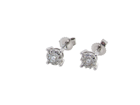 A pair of white gold diamond cluster earrings