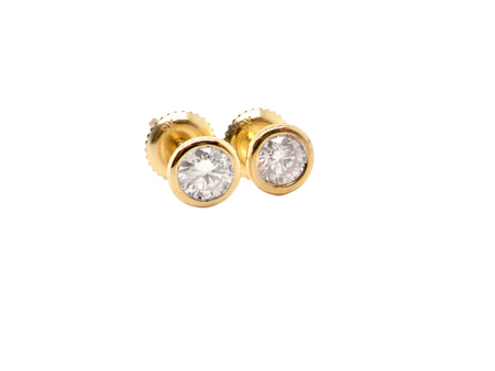 A pair of half carat Diamond Stud Earrings