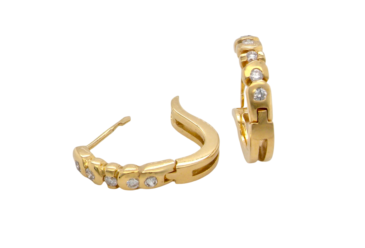 A pair of Diamond hoop earrings