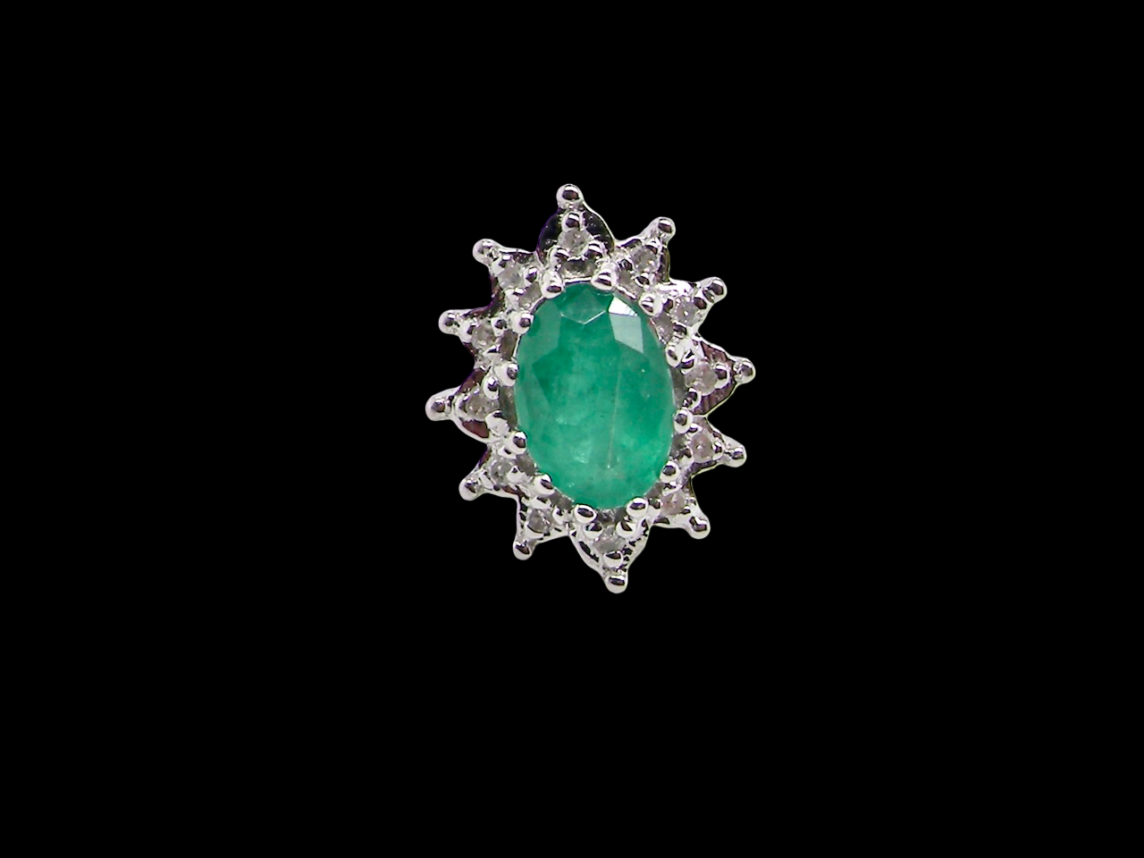A pair of Emerald and Diamond earrings