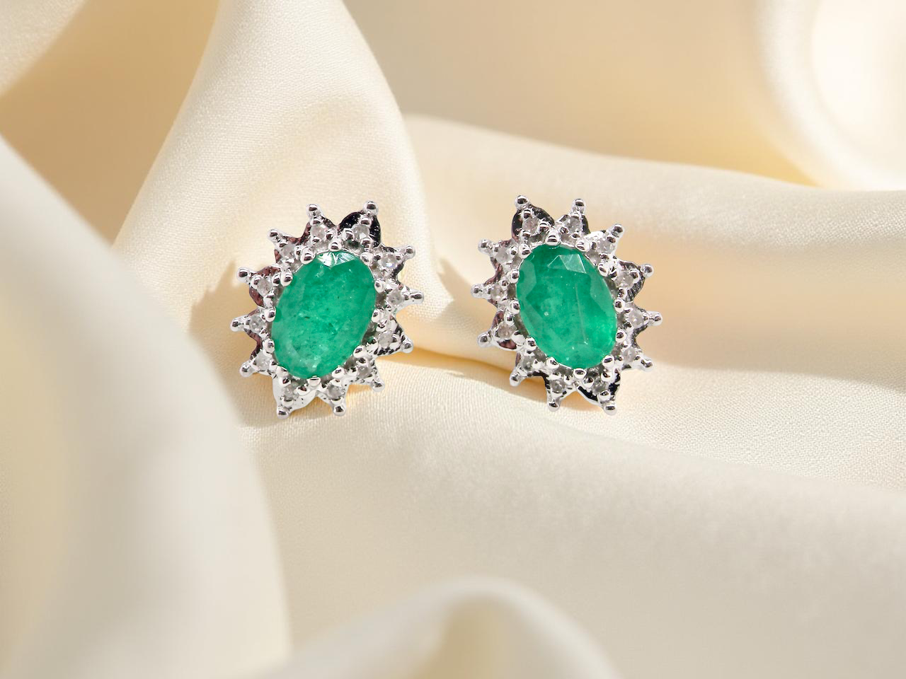 A pair of Emerald and Diamond earrings