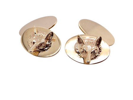 A pair of Fox Head cufflinks