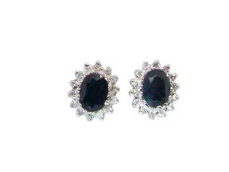 A pair of Sapphire & Diamond cluster earrings