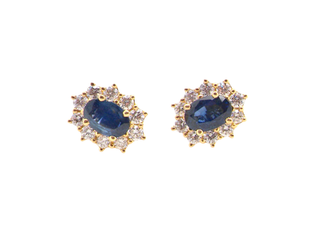 A pair of Sapphire and Diamond Cluster Earrings