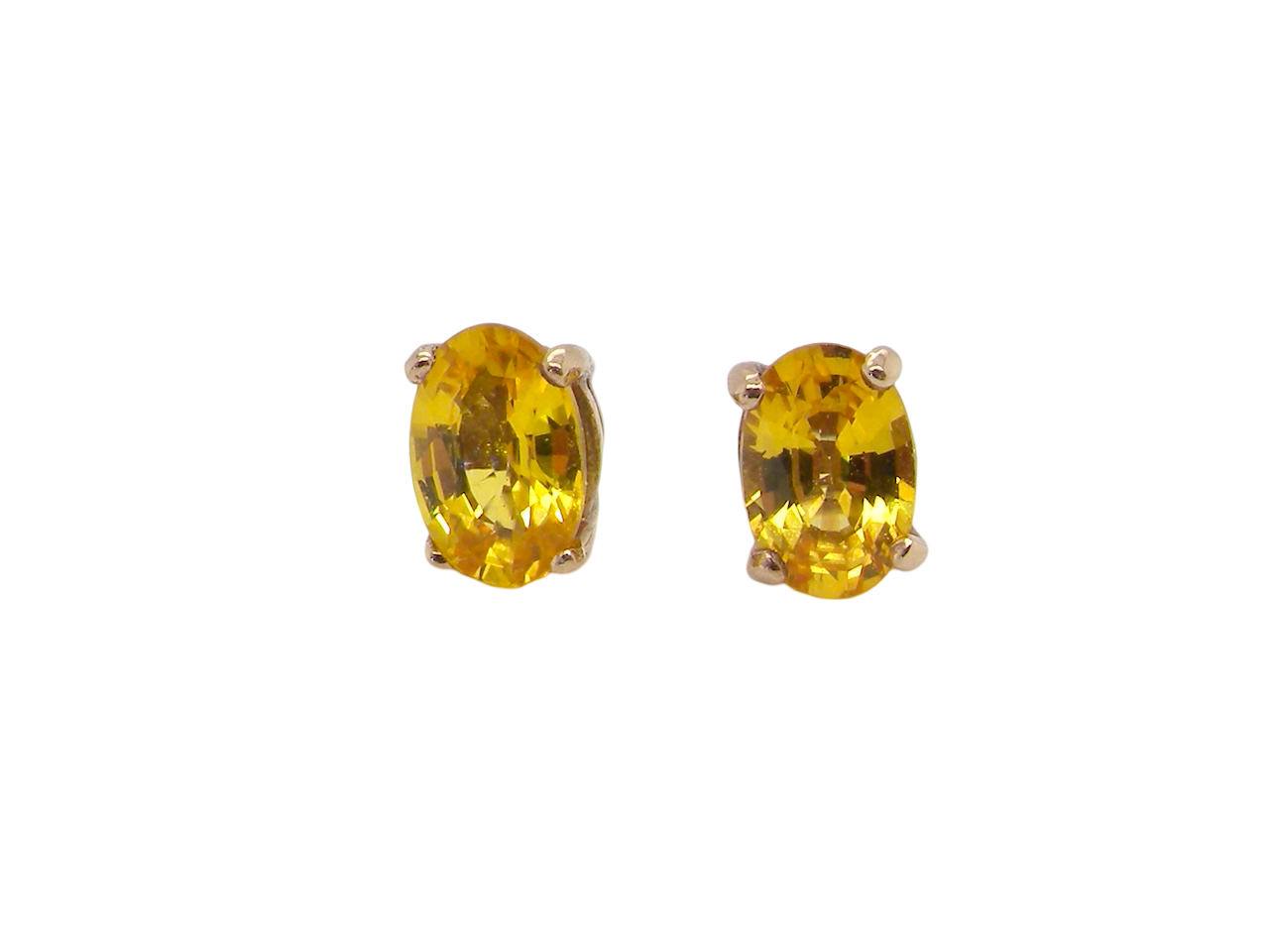 A pair of Yellow Sapphire earrings