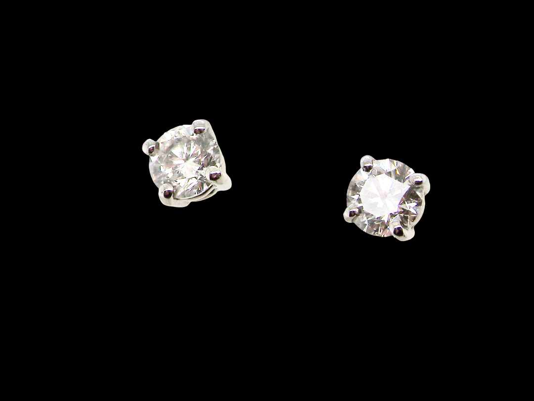 A stunning pair of classic diamond solitaire stud earrings, beautifully crafted in&nbsp;18 carat white gold and featuring two sparkling brilliant cut white diamonds.