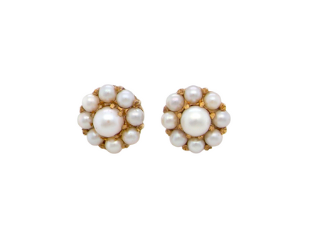 A pair of pearl cluster earrings