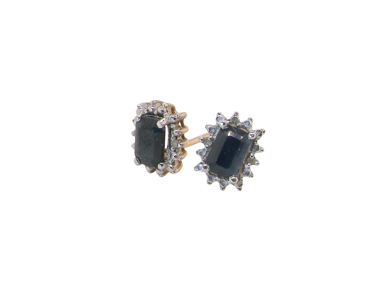 A pair of rectangular cluster earrings.

Each is set with a rectangular sapphire, ink black blue, 6x4mm. Around the edge an illusion of white dots and small white diamonds.