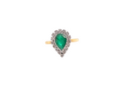 A pear shaped Emerald and Diamond cluster ring