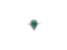 A pear shaped Emerald and Diamond cluster ring