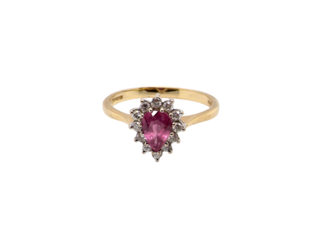 A pear shaped ruby and diamond cluster ring