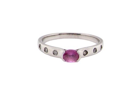 A platinum Pink Sapphire and Diamond Ring