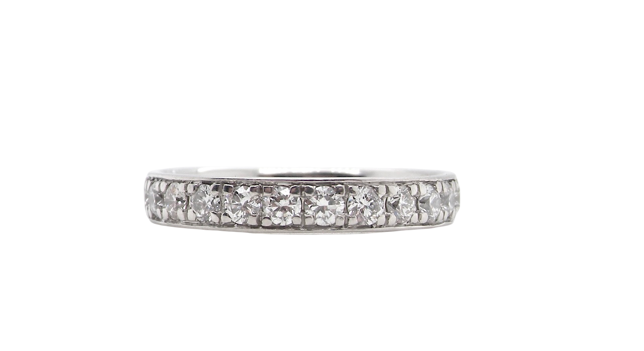 A platinum half hoop diamond eternity ring