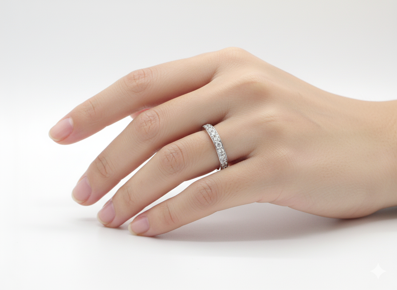 A platinum half hoop diamond eternity ring