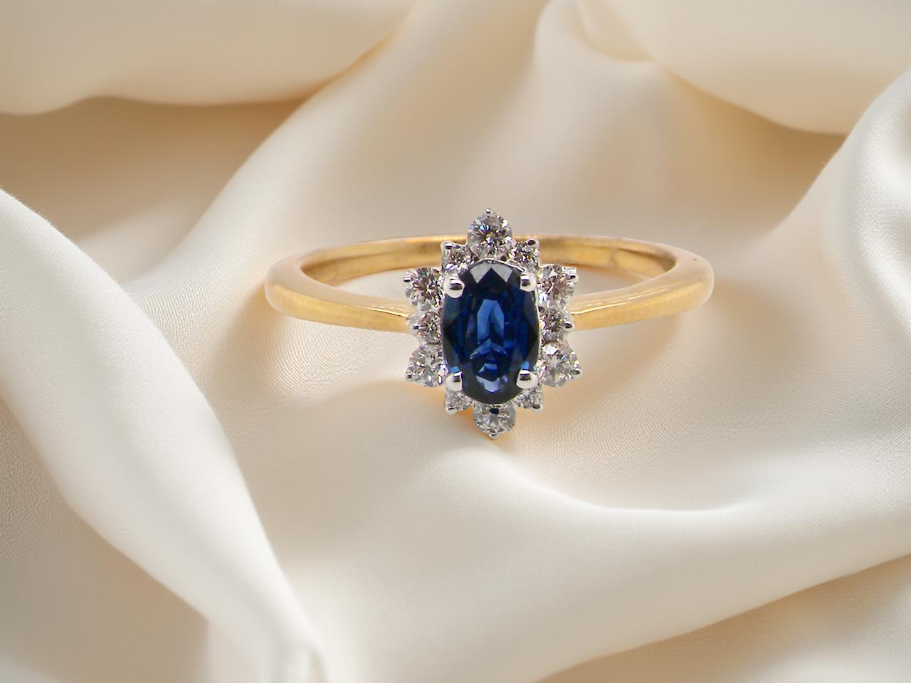 A pretty 18 carat gold Sapphire and Diamond ring