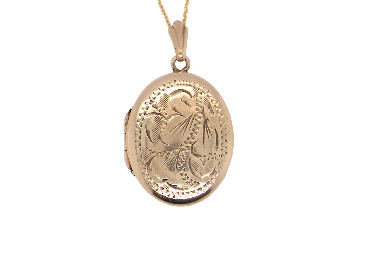 A pretty oval shaped locket. Measures 22x17mm. Hand engraved front, plain reverse


