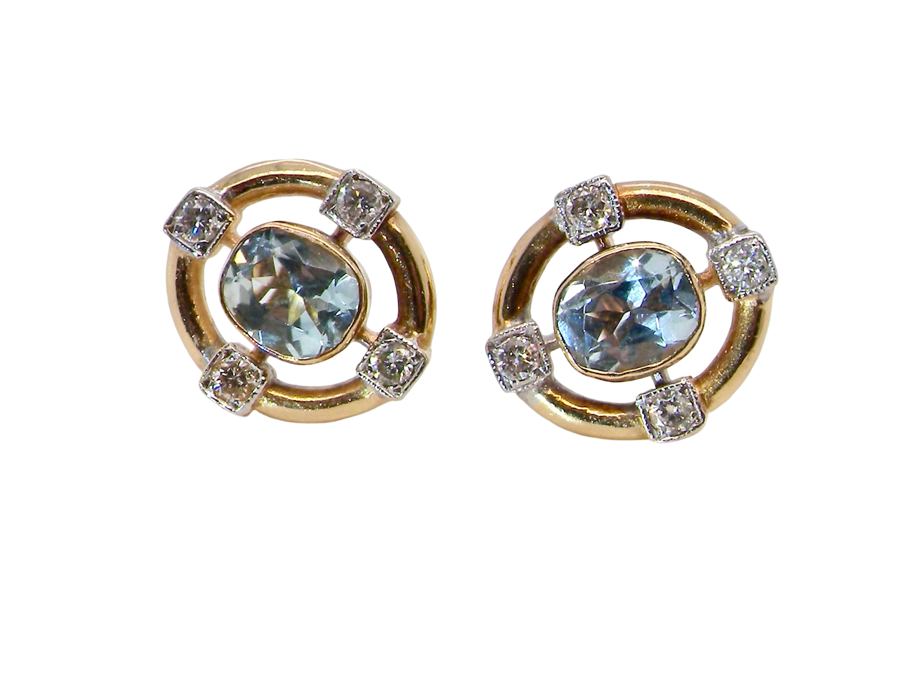 A pretty pair of earrings. Each is set with an aquamarine centre stone, 6x4.5mm, 