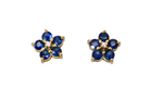 A pretty pair of gold earrings each floral shaped with a small diamond centre stone surrounded by five petals, these round sapphires
