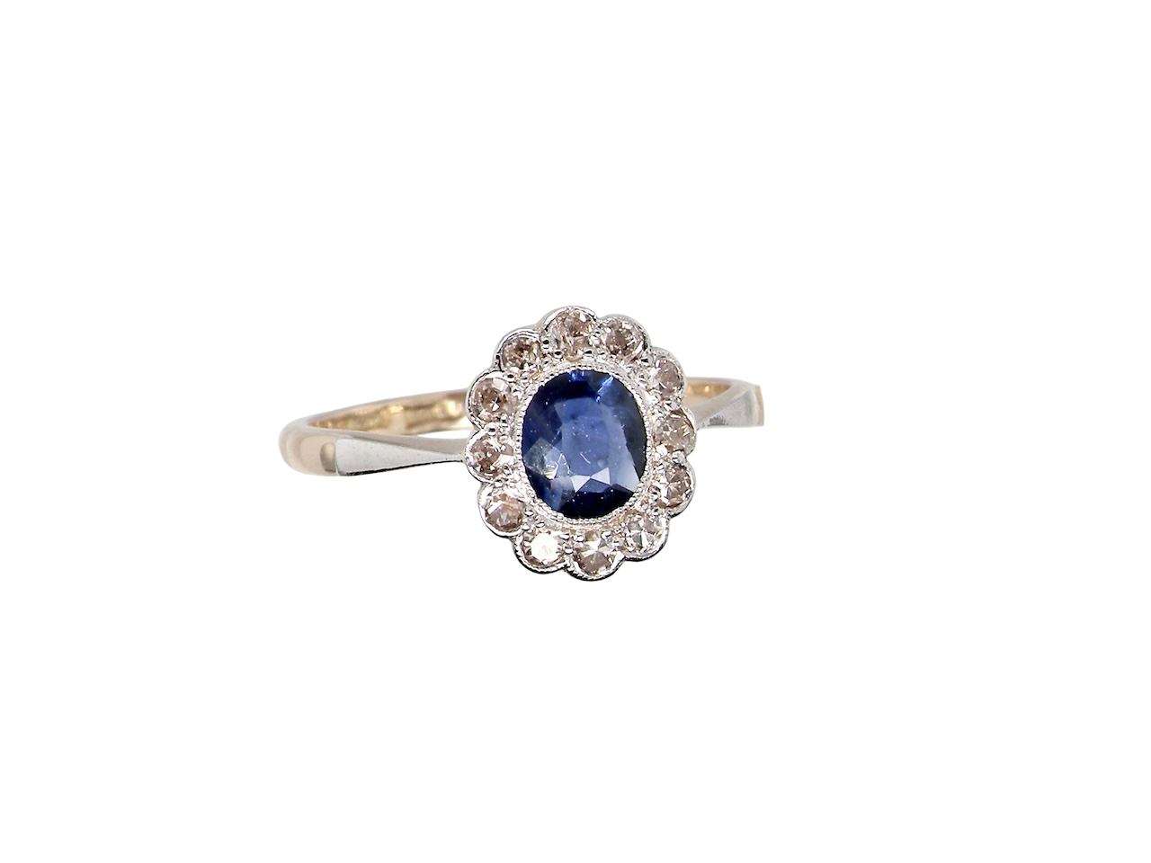 A pretty vintage Sapphire and Diamond cluster ring