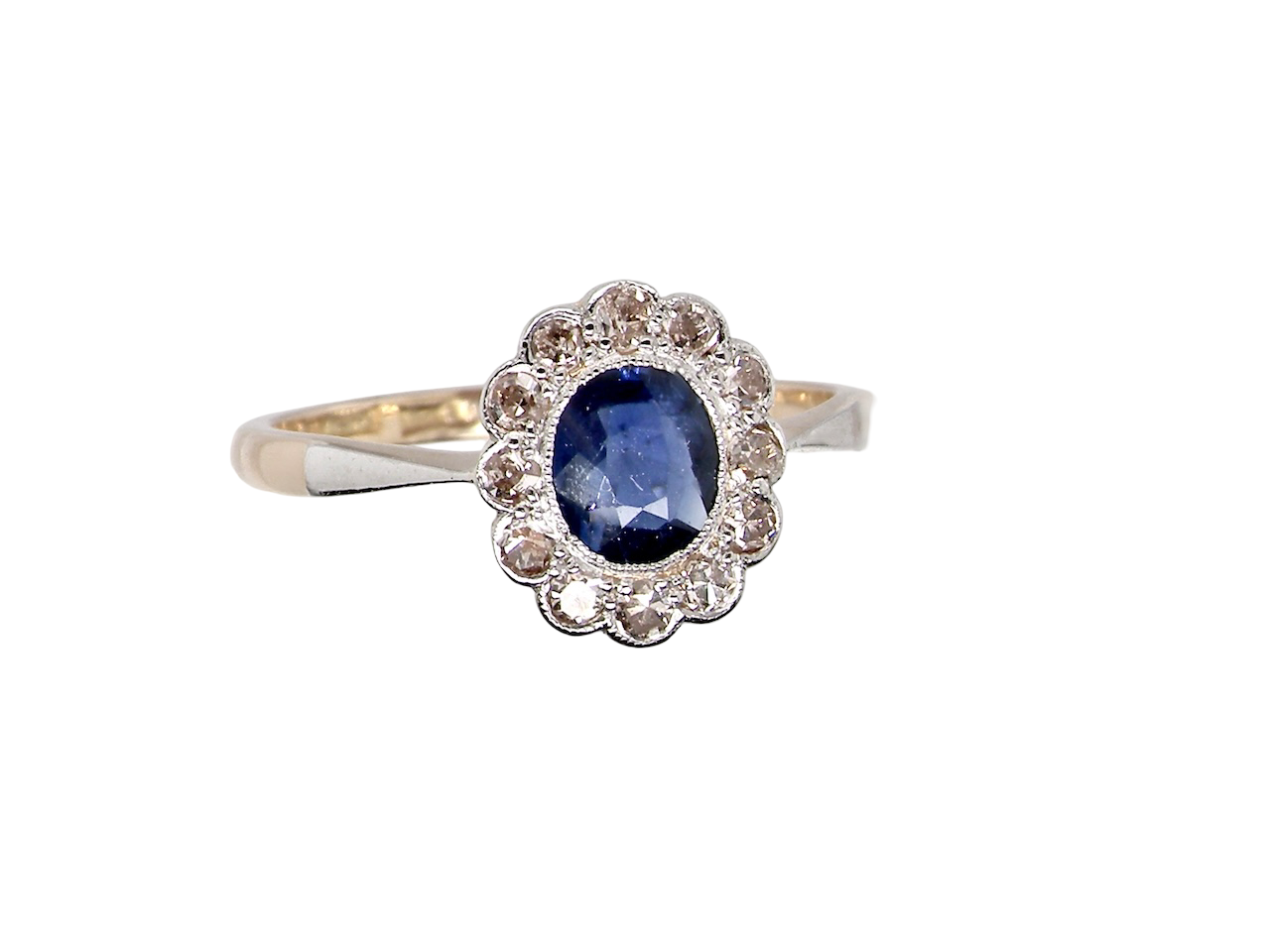 A pretty vintage Sapphire and Diamond cluster ring