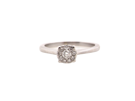 A pretty white gold Diamond Cluster ring