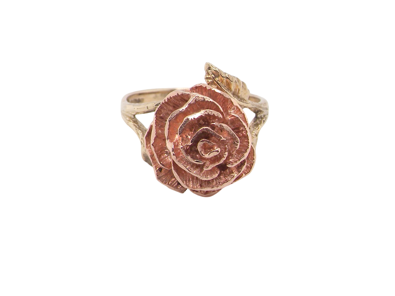 Rose gold ring shaped like a rose on a white background