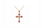A ruby & diamond fancy cross
